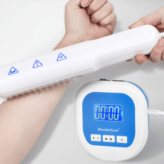 Person using BU-1 home UVB phototherapy device