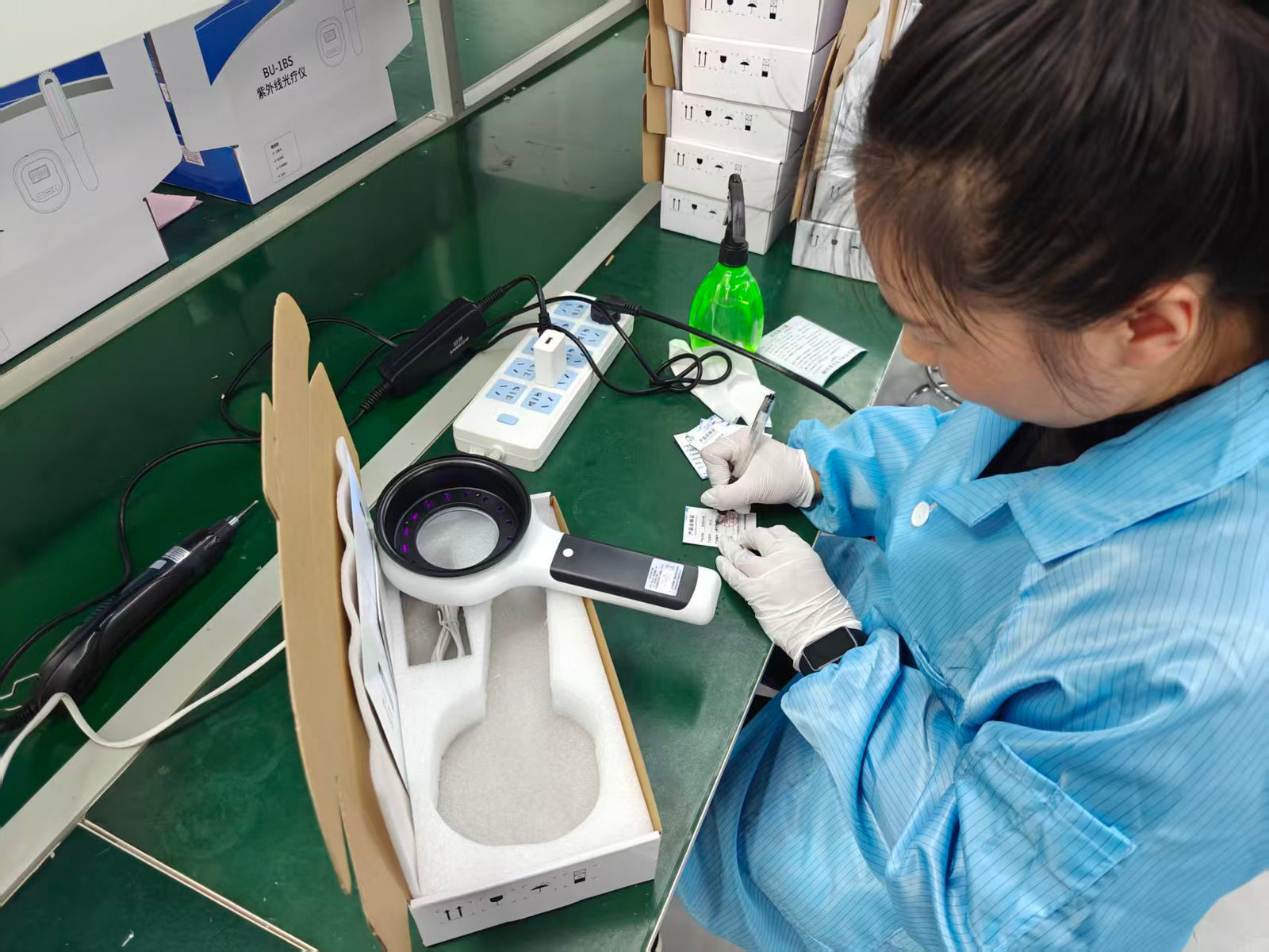YouWeMed worker carrying out final product inspection